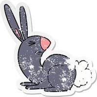 distressed sticker of a cartoon annoyed rabbit vector