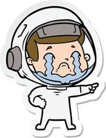 pegatina de un astronauta llorando de dibujos animados