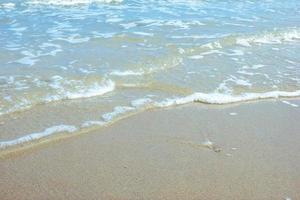 Sea wave on the beach photo