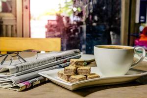 coffee cup with newspaper photo