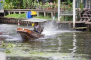 Canal in countryside wiht boat blur background of Illustration,Abstract Blurred photo