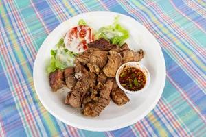 Grilled steak meat with vegetable salad photo