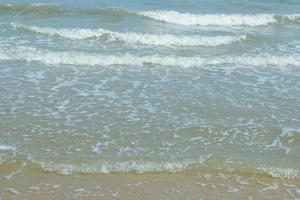 Sea wave on the beach photo