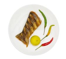 Fried fish on white dish, isolated on white background,clipping path photo