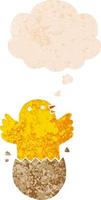 cartoon hatching bird and thought bubble in retro textured style vector