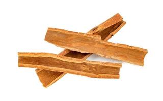 cinnamon sticks isolated on white background photo