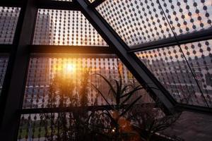 sunset through a glass roof photo