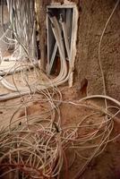 electrical cables on the wall photo