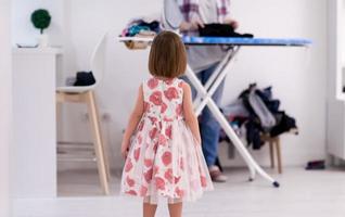 mother and little daughter spending time together at home photo