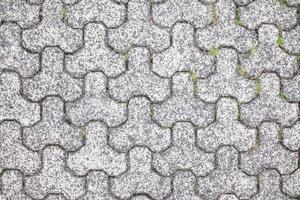 Gray paving slabs on the road photo