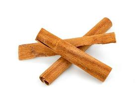 cinnamon sticks isolated on white background photo