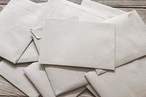 Brown Letter Envelop on wooden table photo