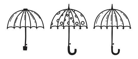 conjunto de paraguas abiertos. sombrillas de garabatos. ilustración vectorial vector
