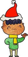 textured cartoon of a friendly boy wearing santa hat vector