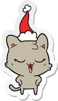 pegatina feliz caricatura de un gato con gorro de Papá Noel vector