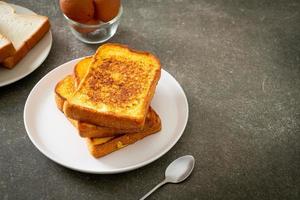 french toast on white plate photo