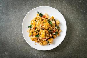 stir-fried egg with Thai basil and chilli photo