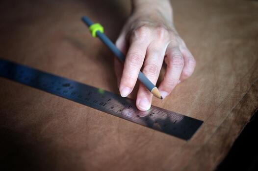 Close-up of a hardworking professional  . Concept workshop . craft photo