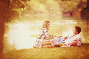 Couple in love enjoying picnic time photo