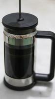 Close-Up Of Coffee Press Maker - French Press Coffee Maker photo