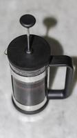 Close-Up Of Coffee Press Maker - French Press Coffee Maker photo