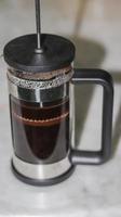 Close-Up Of Coffee Press Maker - French Press Coffee Maker photo