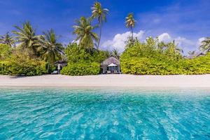 Outdoor postcard concept as tropical beach paradise at luxury beach resort with overwater bungalows, Maldives or French Polynesia. Amazing travel vacation landscape, exotic shore