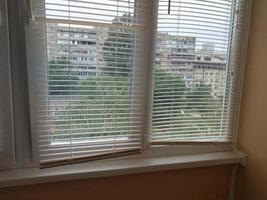 Installed metal-plastic windows on the balcony of a residential building photo