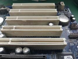 Retro computer motherboard with microcircuits photo