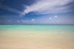 Nature landscape view of beautiful tropical beach and sea in sunny day. Beach sea space area photo