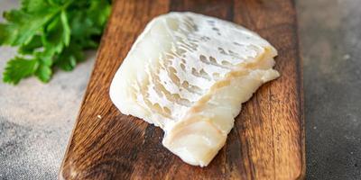 cod fish white fillet fresh meal food snack on the table copy space food background photo