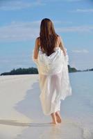 asian bride on beach photo