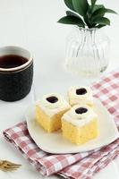 Mini Square Slice Cake with Bluberry Jam Topping photo