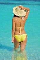 beautiful  woman resting on tropical  beach photo