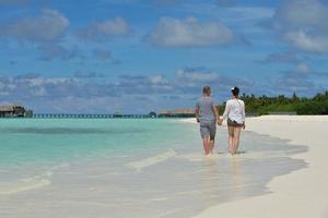 happy young  couple at summer vacation have fun and relax at beach photo