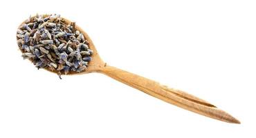 dried lavender flowers in wooden spoon isolated photo