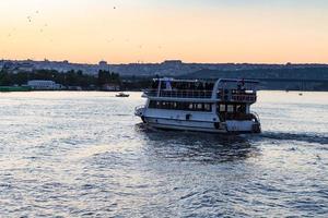 excursion boat in Golden Horn bay in Istanbul city photo