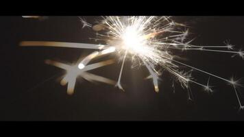 Shining sparkler in the night video