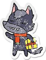 distressed sticker of a angry christmas wolf cartoon vector