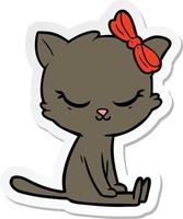 sticker of a cute cartoon cat with bow vector