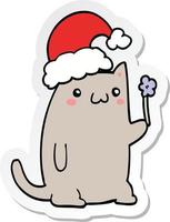 sticker of a cute cartoon christmas cat vector