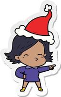 sticker cartoon of a woman pointing wearing santa hat vector