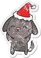 happy distressed sticker cartoon of a dog wearing santa hat vector