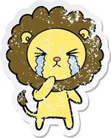 distressed sticker of a cartoon crying lion vector