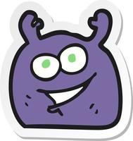 sticker of a cartoon little alien vector