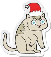 sticker of a cartoon cat wearing christmas hat vector