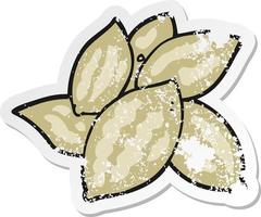 retro distressed sticker of a cartoon almonds vector