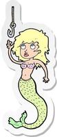 sticker of a cartoon mermaid and fish hook vector