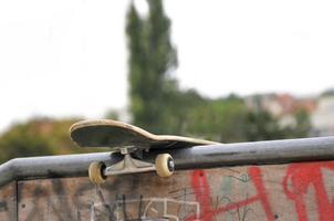 Skate board left behind in park photo