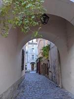 Streets of an old European city, cafes, restaurants, monuments, cathedrals and parks. City of Lviv, Ukraine. photo